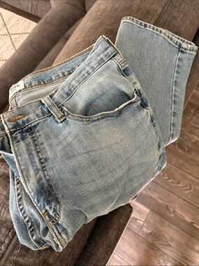 Denizen from Levi's Light Blue Denim Jeans with Tan Leather Patch